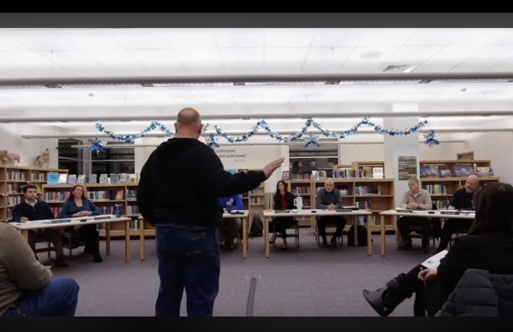Resident John Maxedon addresses the 207U board on January 21st.