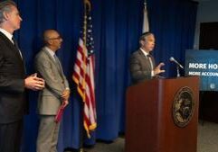 Attorneys general sue to keep consumer bureau funded
