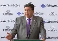 Lawsuit demands Pritzker’s office release docs over pic with criminal