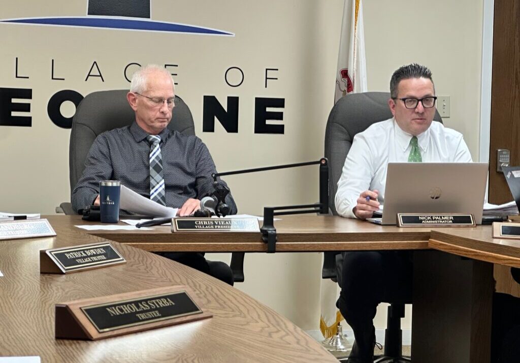 Peotone Village Administrator gives an overview of the Village while Mayor Chris Vieaux looks on-photo by Andrea Arens.